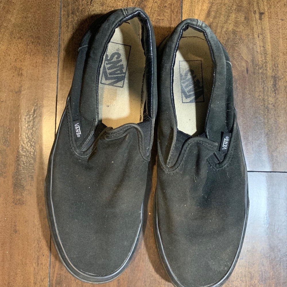 Black slip on vans.
